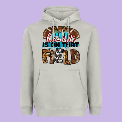 My Heart Is On That Field Football Heavyweight Hoodie Designed By Ranaportraitstore