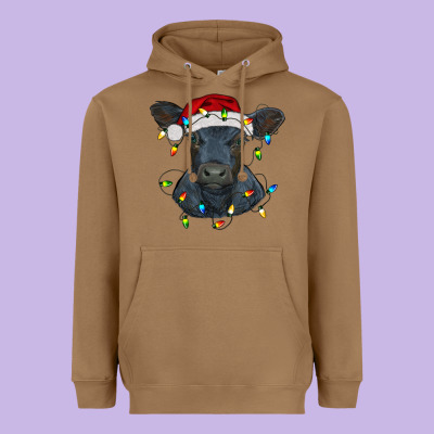 Christmas Baby Black Angus Calf With Lights Heavyweight Hoodie Designed By Ranaportraitstore