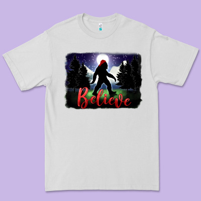 Bigfoot Believe Christmas Premium Tee Designed By Fadigitalartstudio