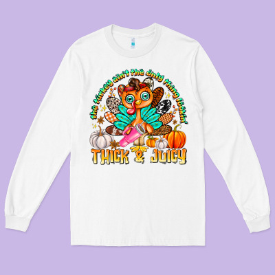 The Turkey Ain’t The Only Thing Lookin Thick & J Long Sleeve Tee Designed By Cowhidedigitalart
