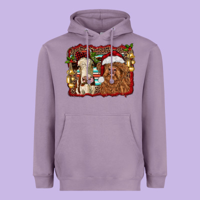 Christmas Heifer And Highland Cow With Serape Background Heavyweight Hoodie Designed By Ranaportraitstore