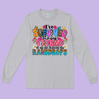 Ive Survived Too Many Storms To Be Thered By Raind Long Sleeve Tee Designed By Cowhidedigitalart