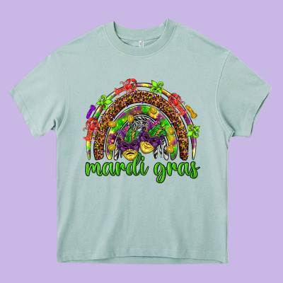 Mardi Gras Rainbow And Masks Heavy Core Tee Designed By Howdyjamesfarm