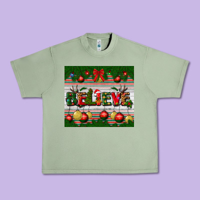 Christmas Believe Urban Heavy Tee Designed By Bundleandbundleshop
