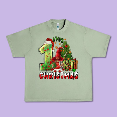 First Christmas Urban Heavy Tee Designed By Fadigitalartstudio