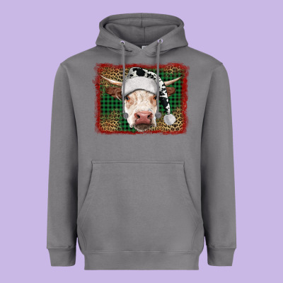 Merry Christmas Hereford Cow With Background Heavyweight Hoodie Designed By Ranaportraitstore