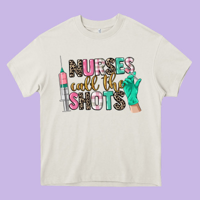 Nurses Call The Shots Heavy Core Tee Designed By Cowgirlartshop