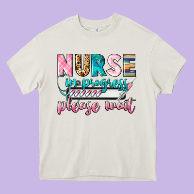 Nurse In Progress Heavy Core Tee Designed By Cowgirlartshop