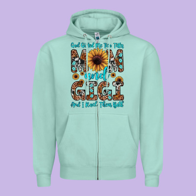 God Gifted Me Two Titles Mom And Gigi  And I Rock Them Both Zipper Hoodie Designed By Jahusdesignshop