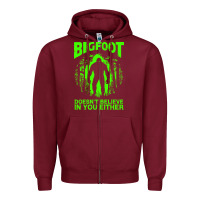 Burgundy bigfoot believer t  shirt bigfoot doesnt believe in you either t  shir Zipper Hoodie - linhVisuals