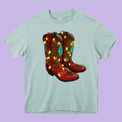 Western Christmas Boots Heavy Core Tee Designed By Ranaportraitstore