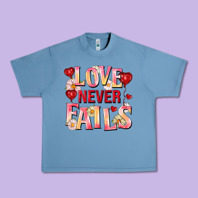 Love Never Fails Urban Heavy Tee Designed By Fadigitalartstudio