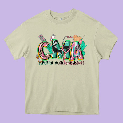 Certified Medical Assistant Heavy Core Tee Designed By Cowgirlartshop